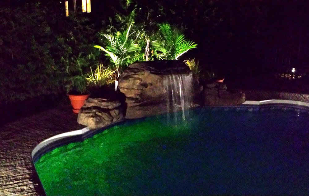 The Oasis waterfall at night